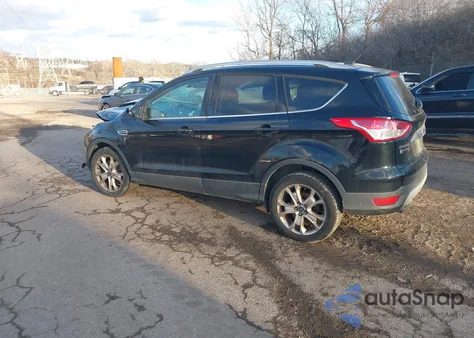 2016 Ford Escape Titanium z USA, uszkodzony, nr VIN 1FMCU0J91GUB36876